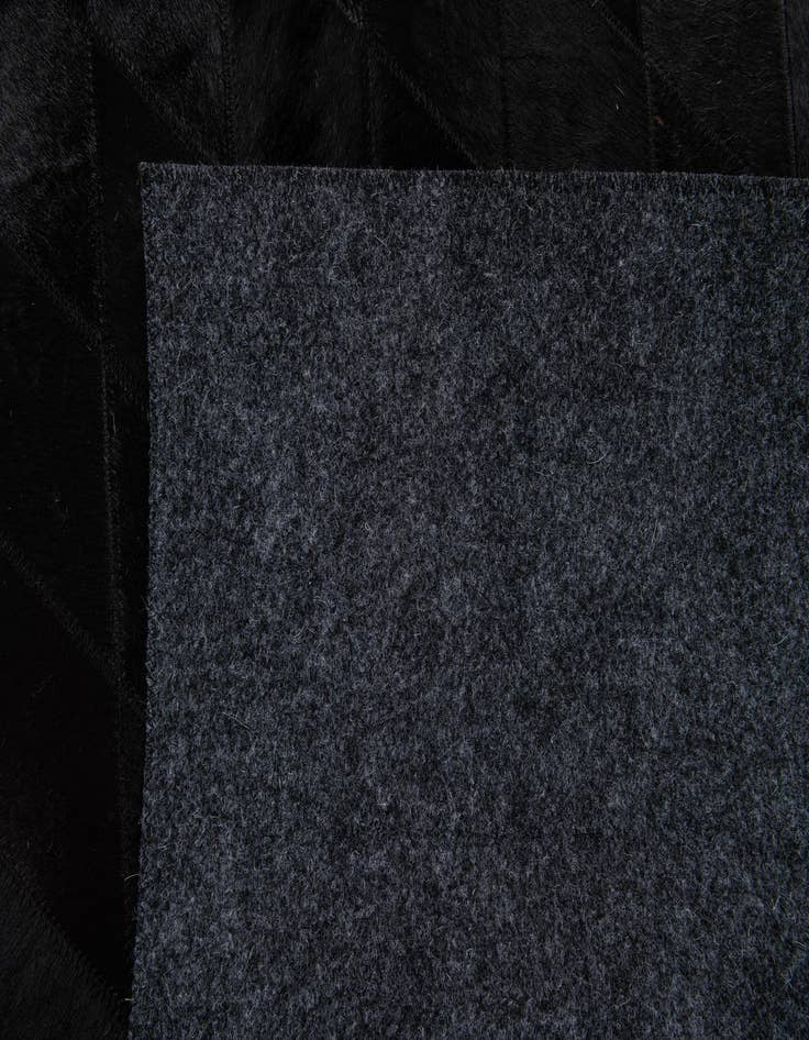 Detail image of 4' x 5' 10 Cowhide Stocks Rug