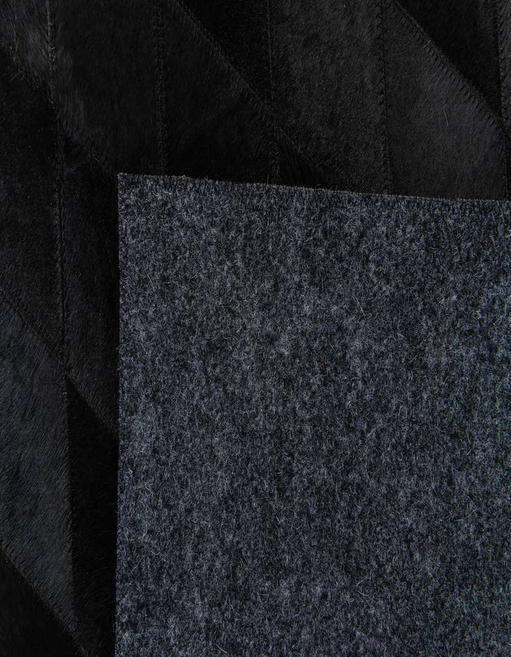 Detail image of 3' 11 x 5' 10 Cowhide Stocks Rug