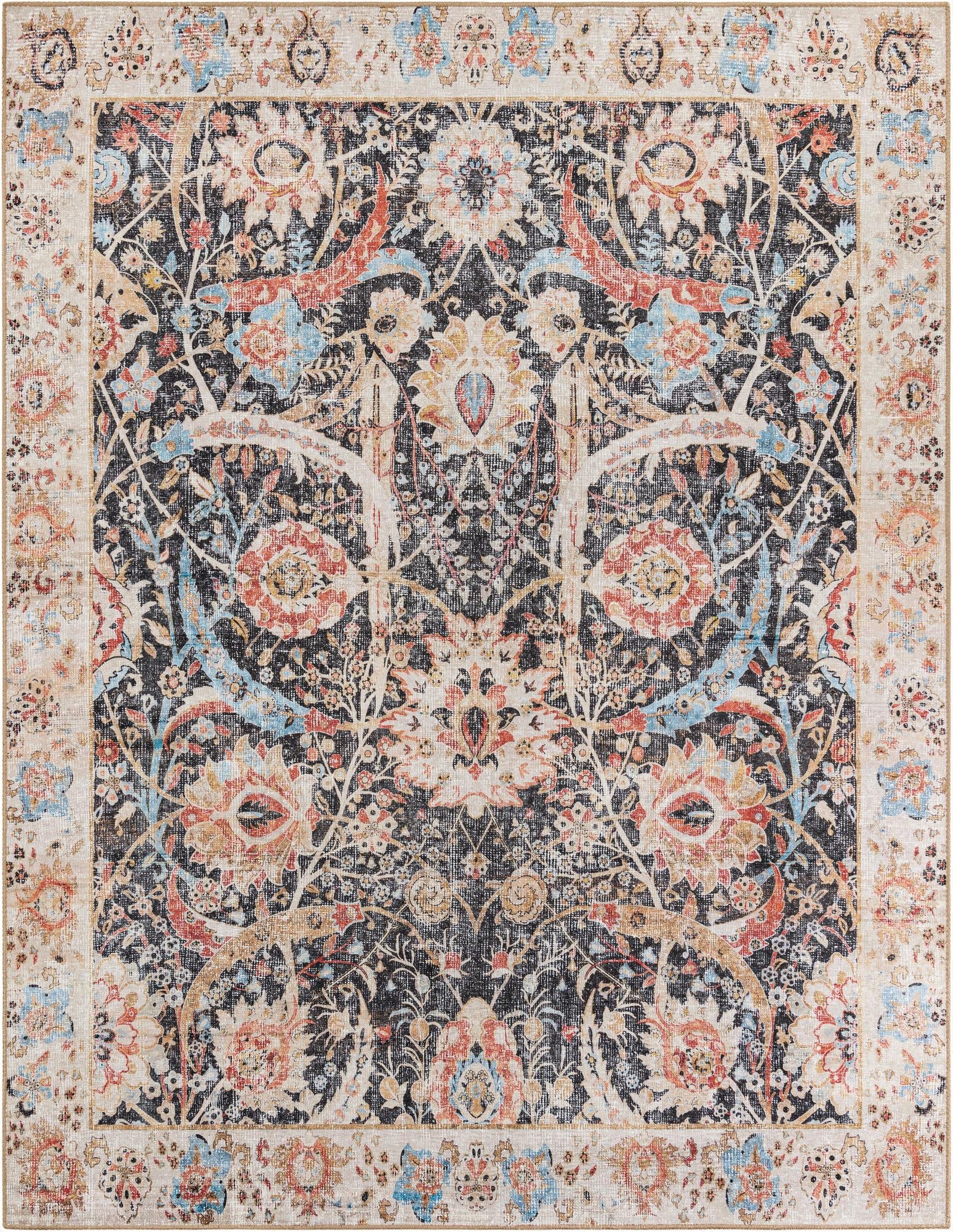 An 8x10 rectangular indoor rug with a distressed black center and a detailed floral and botanical pattern in muted orange, blue, and cream, framed by a light border.