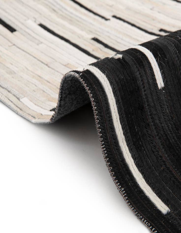 Detail image of 7' 10 x 7' 10 Cowhide Leather Round Rug