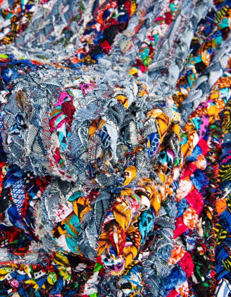 Detail image of 5' 1 x 8'  Hand Braided Chindi Oval Rug