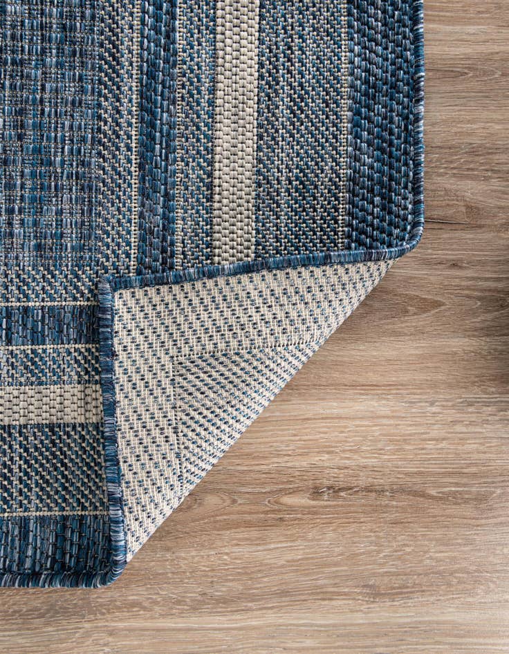 Detail image of 2' 2 x 3' 7 Easy-Clean Border Indoor / Outdoor Hearth Rug