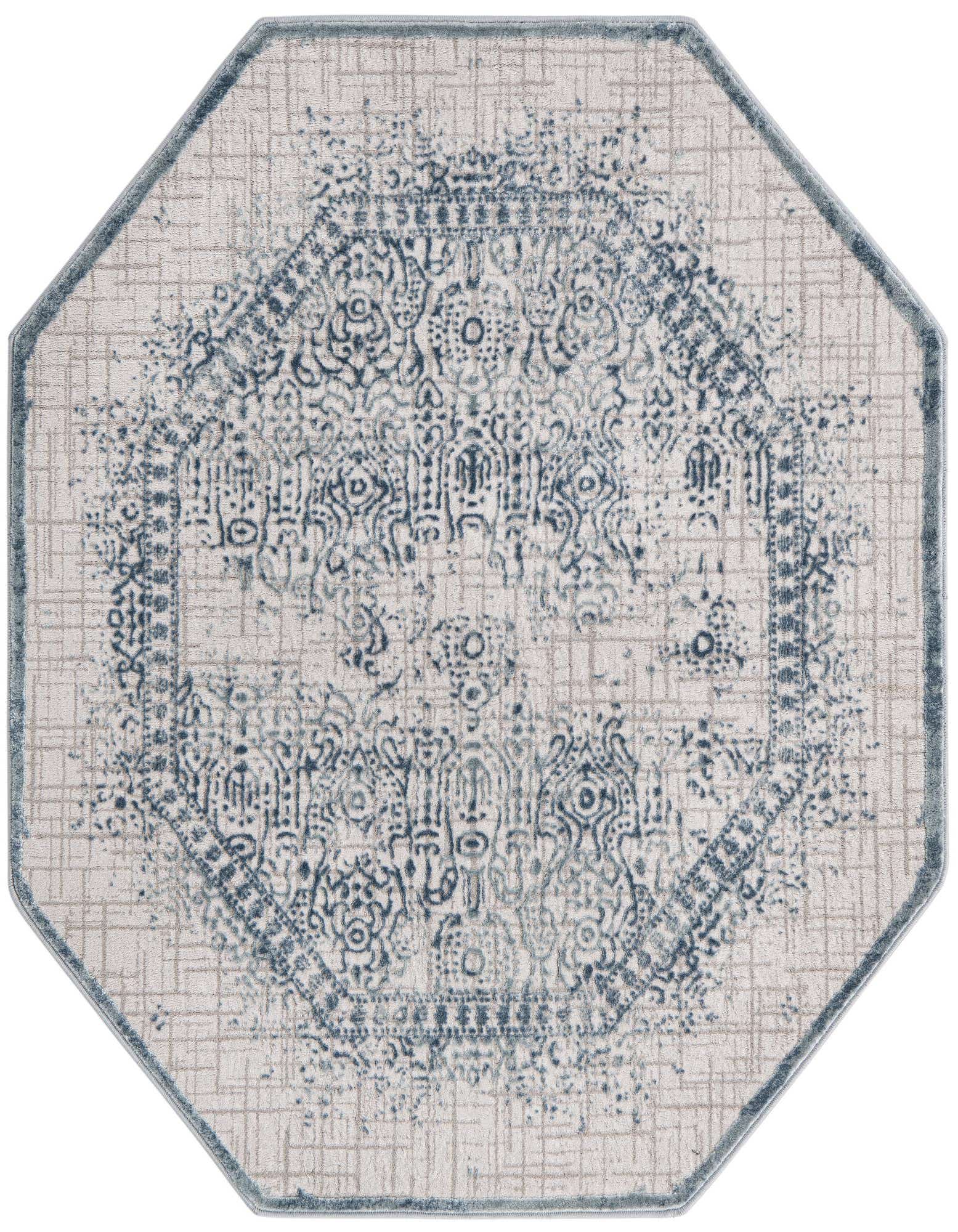 Octagon area rug featuring a distressed blue medallion pattern on a light beige background with a subtle grid texture.