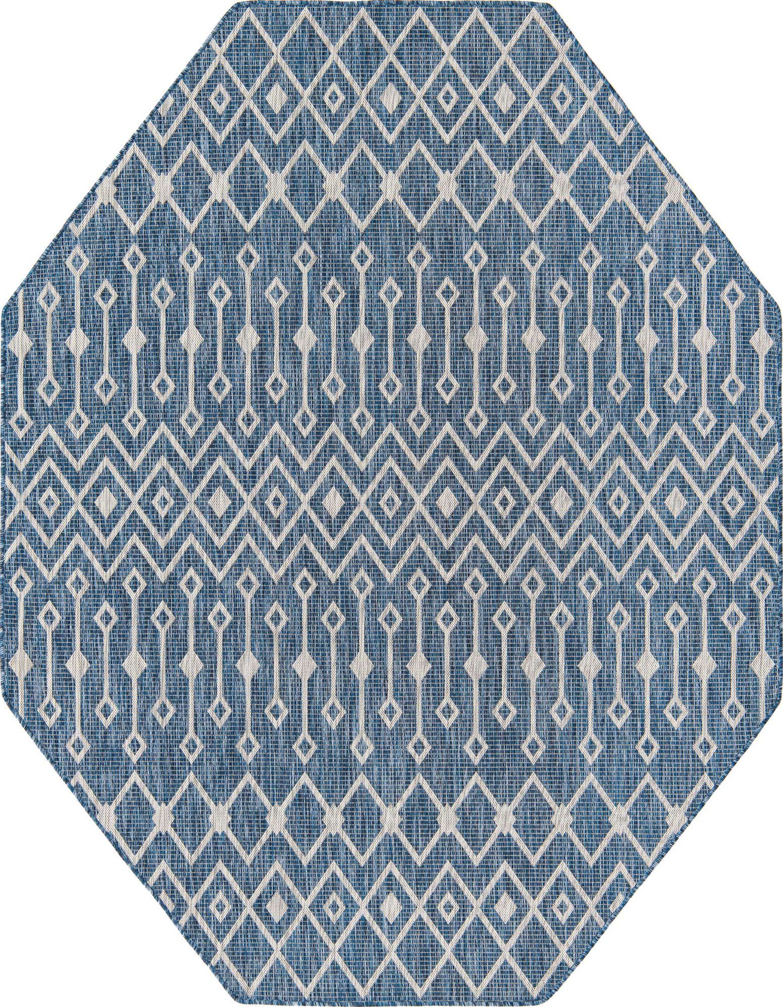 An octagon-shaped blue and white tribal pattern rug, perfect for indoor or outdoor use on a patio.