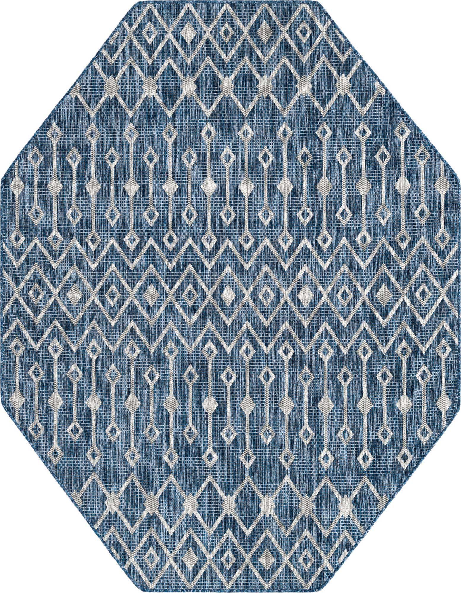 A 7' 0 x 7' 0 octagon blue indoor/outdoor rug with a white tribal geometric pattern, suitable for a patio.