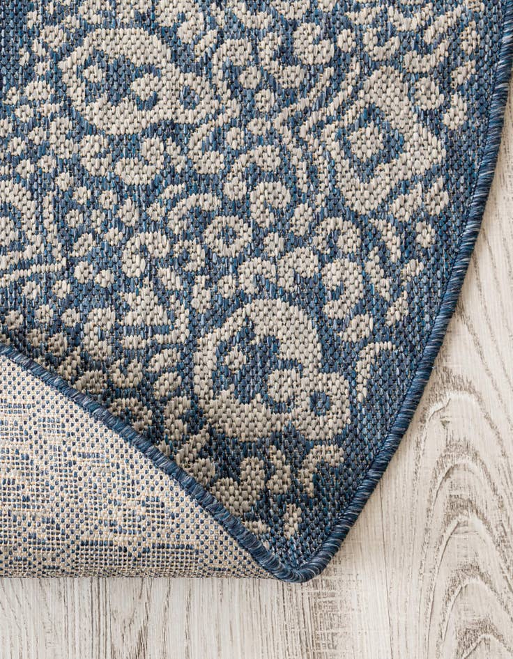 Detail image of 5' 3 x 8' Easy-Clean Border Indoor / Outdoor Oval Rug