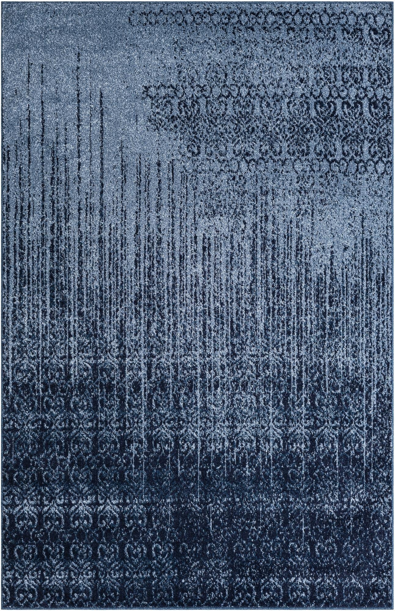 A 5x8 rectangular Angelica rug in varying shades of blue, featuring a transitional abstract pattern with vertical lines and subtle damask motifs.