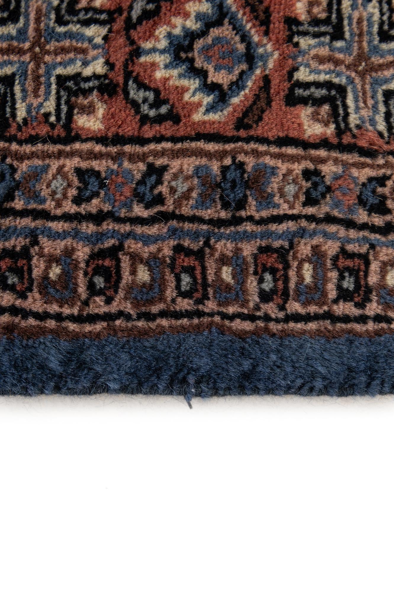 4' 2 x 6' 7 Hand Knotted Bokhara Wool Rug