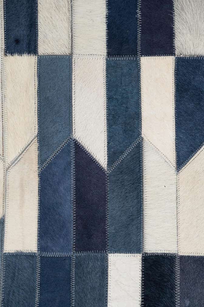 5' x 7' 9 Cowhide Leather Rug