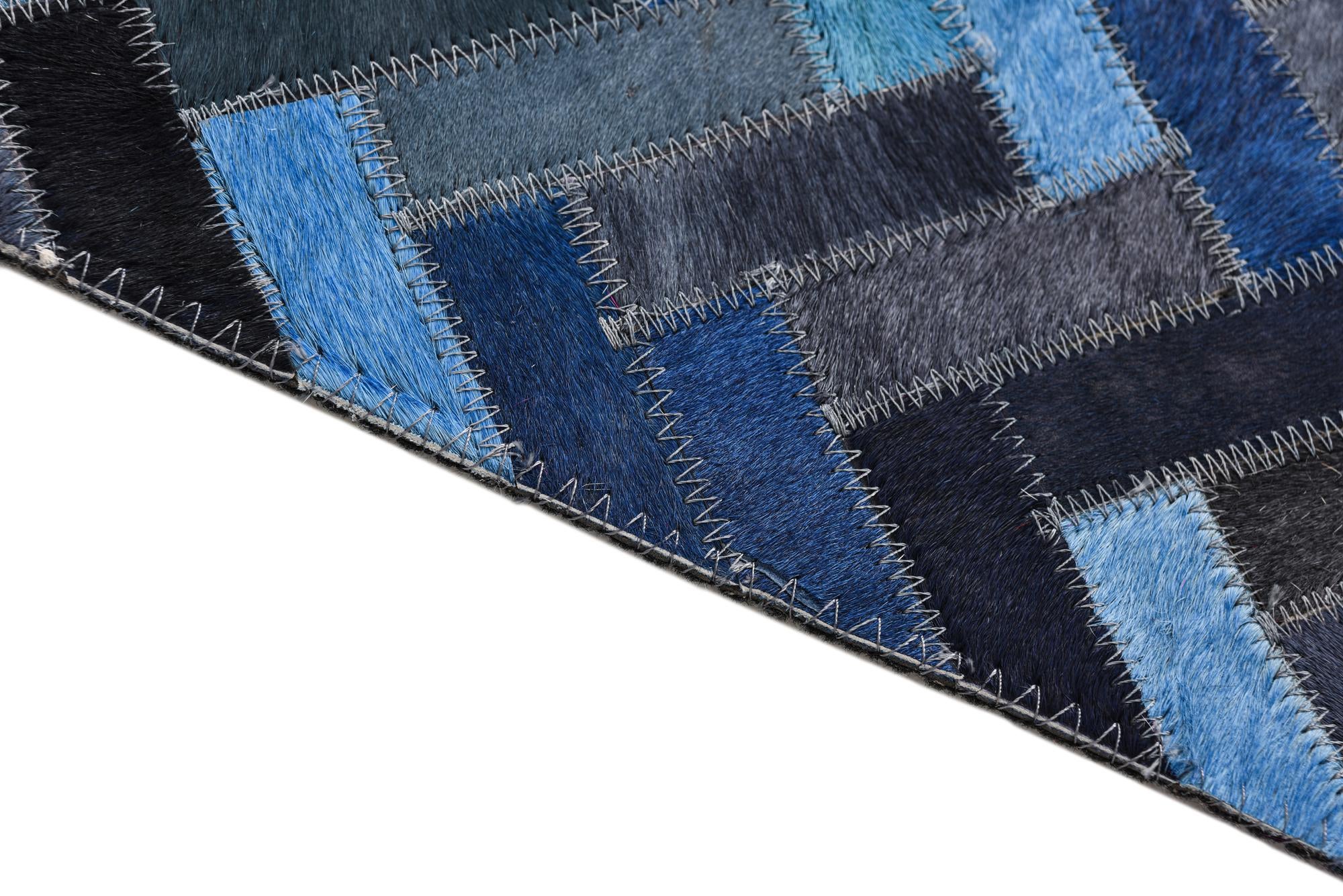 5' 1 x 8' Cowhide Rug