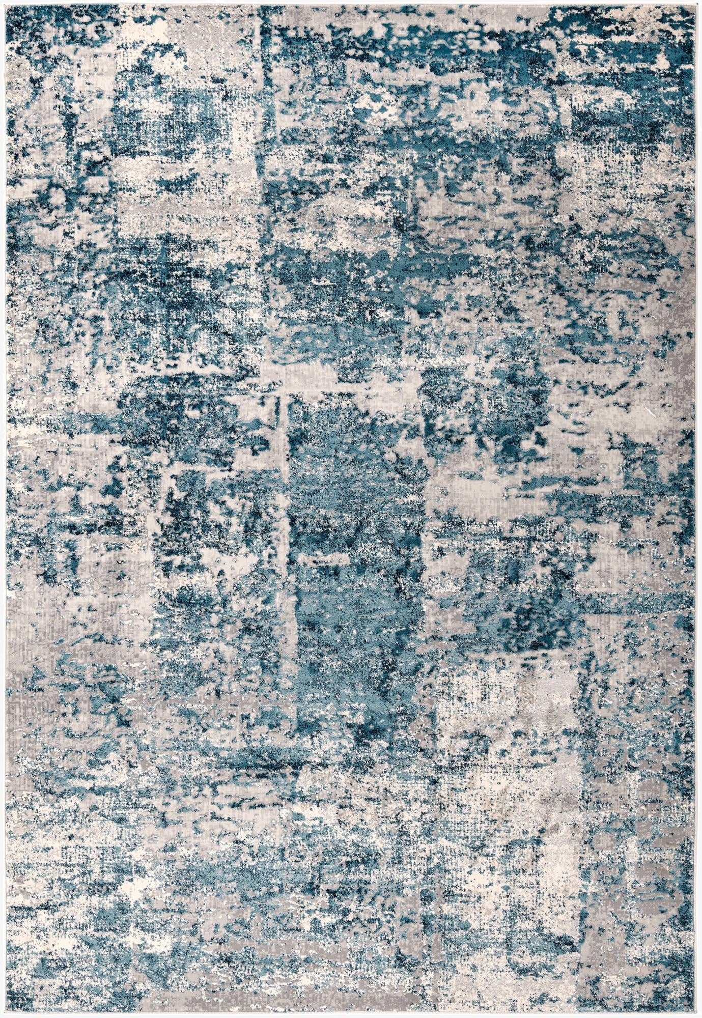 A 6x9 rectangular area rug featuring an abstract, distressed pattern in varying shades of blue, grey, and cream.