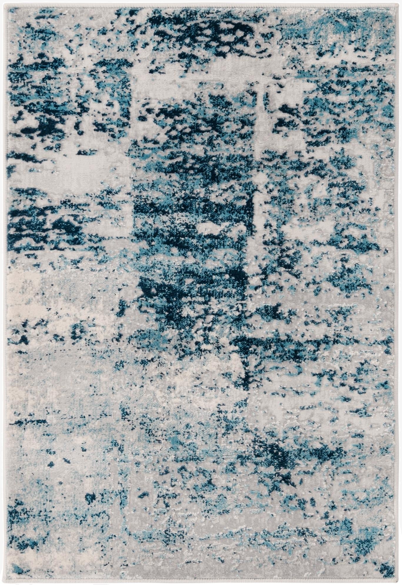 A 2x3 rectangular Finsbury rug featuring an abstract pattern in varying shades of blue and gray, with a textured high/low pile.
