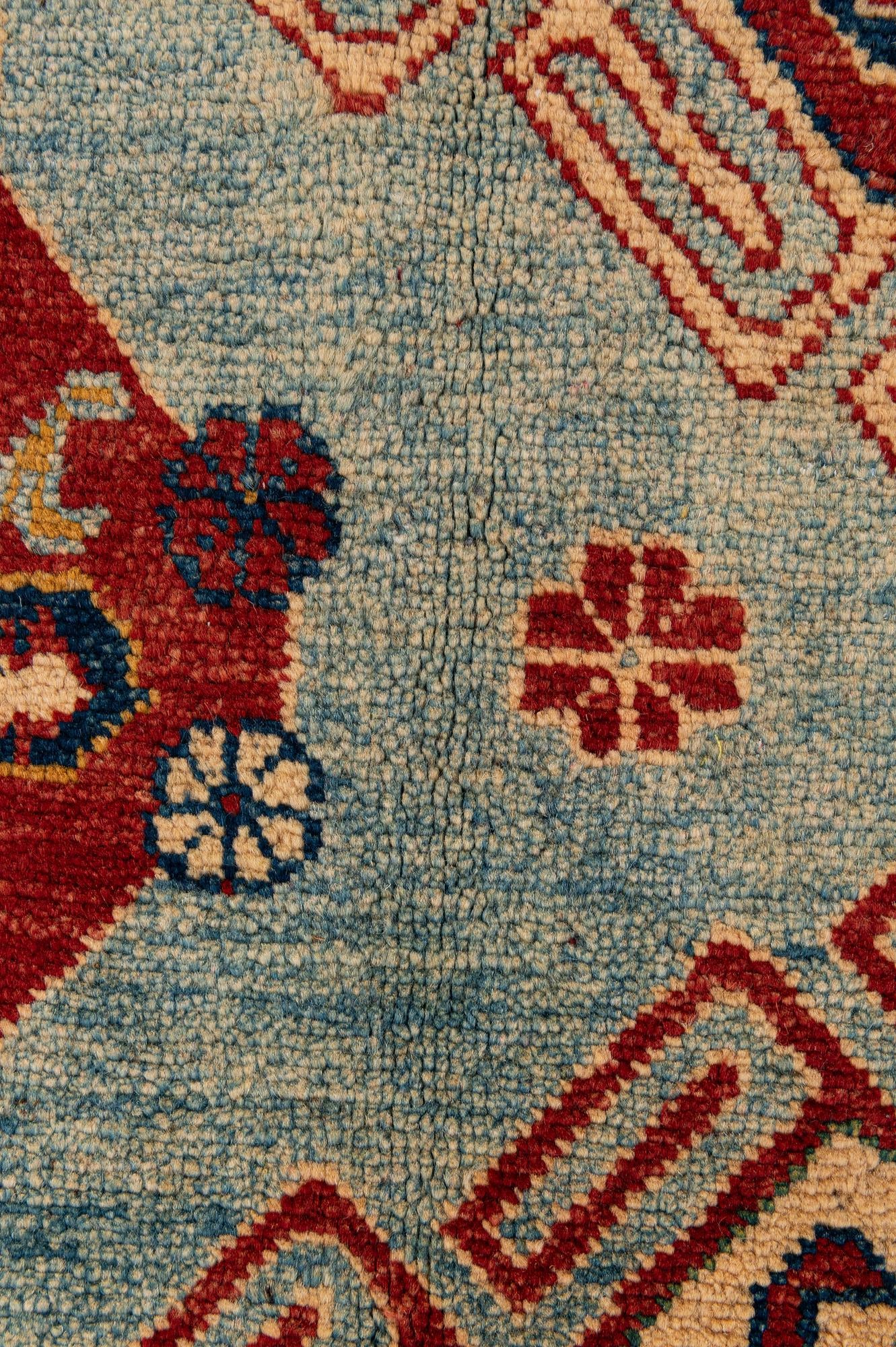 5' 9 x 8' 4 Hand Knotted Kazak Wool Rug
