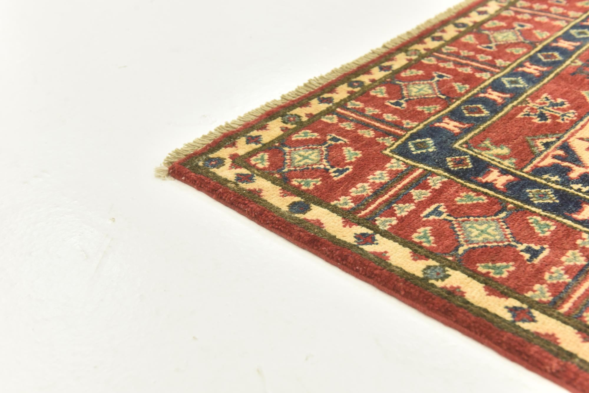 4' x 5' 8 Hand Knotted Kazak Rug