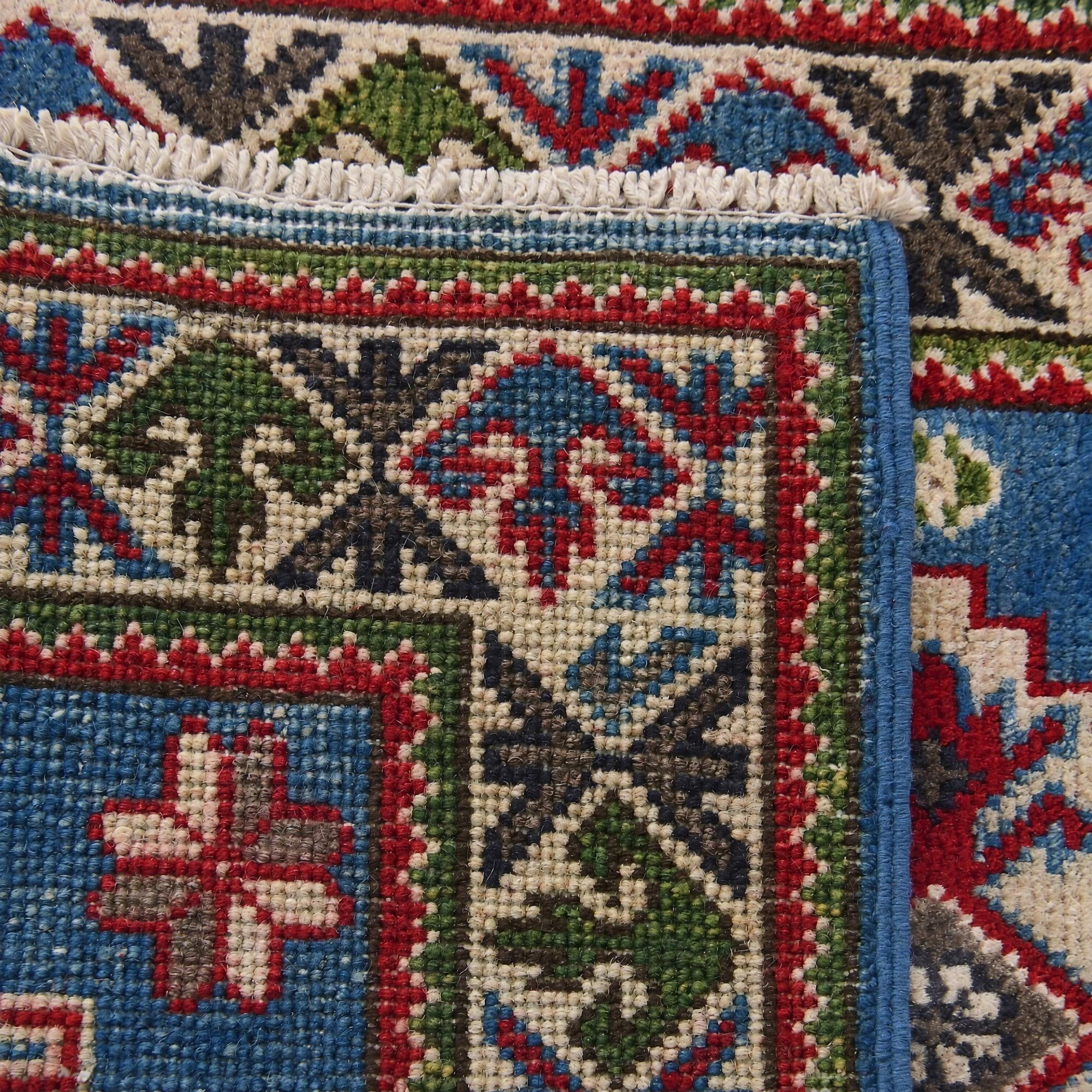 55cm x 95cm Hand Knotted Kazak Rug