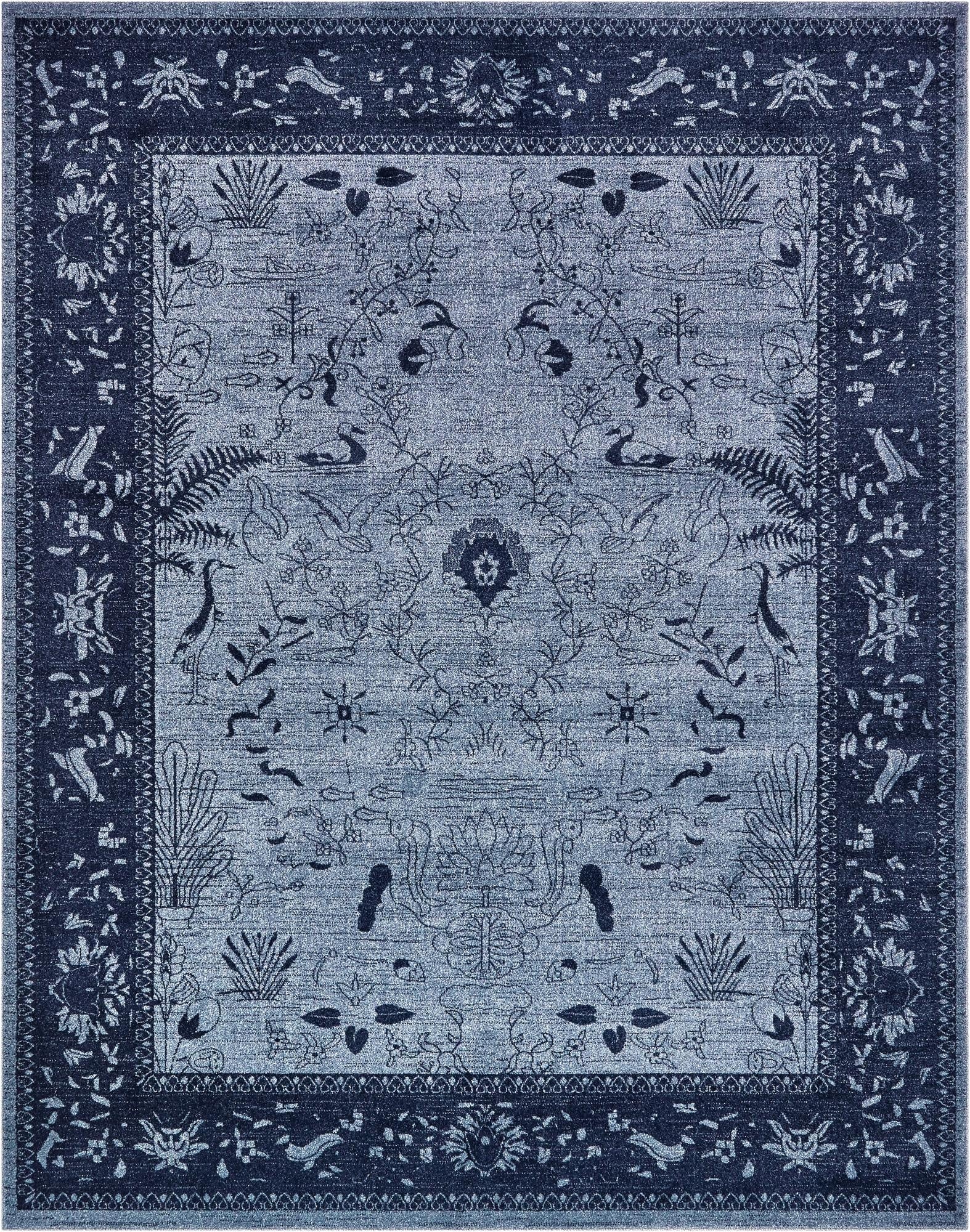 An 8x10 rectangular blue area rug with a traditional coastal pattern featuring birds, leaves, and floral motifs.
