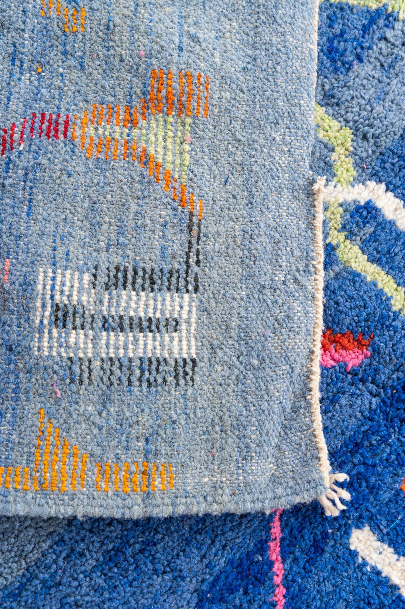 5' x 8' 7 Hand Knotted Moroccan Wool Rug