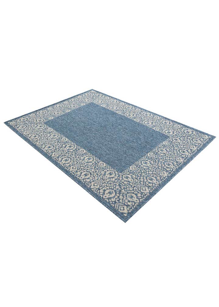 5' 3 x 7' Easy-Clean Border Indoor / Outdoor Rug