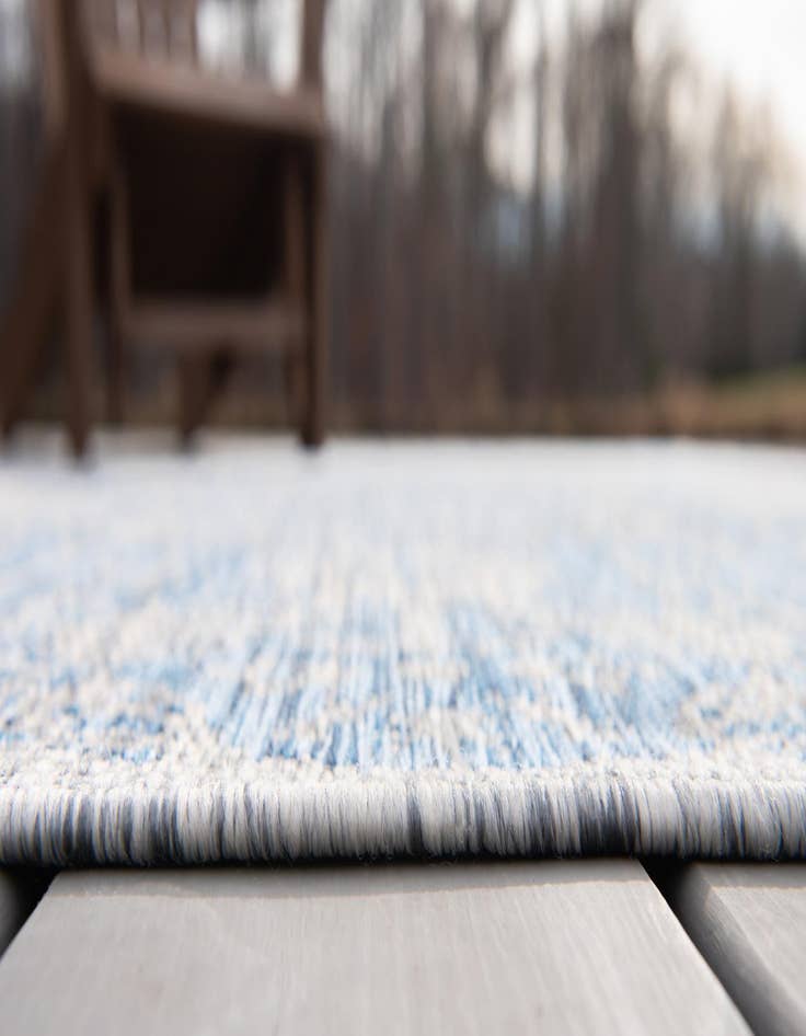 Detail image of 5' 3 x 8'  Washable Traditional Indoor / Outdoor Rug
