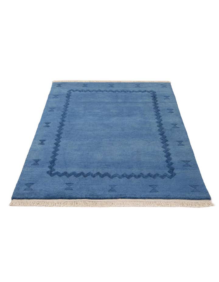 3' 11 x 5' 4 Hand Knotted Tibet Wool Rug