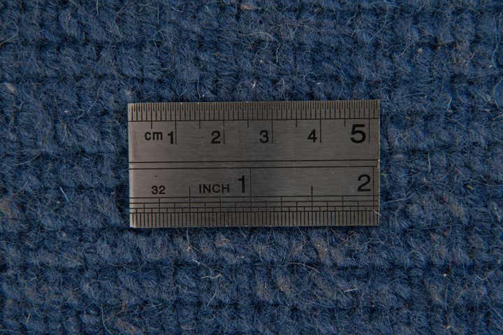 3' 11 x 5' 4 Hand Knotted Tibet Wool Rug