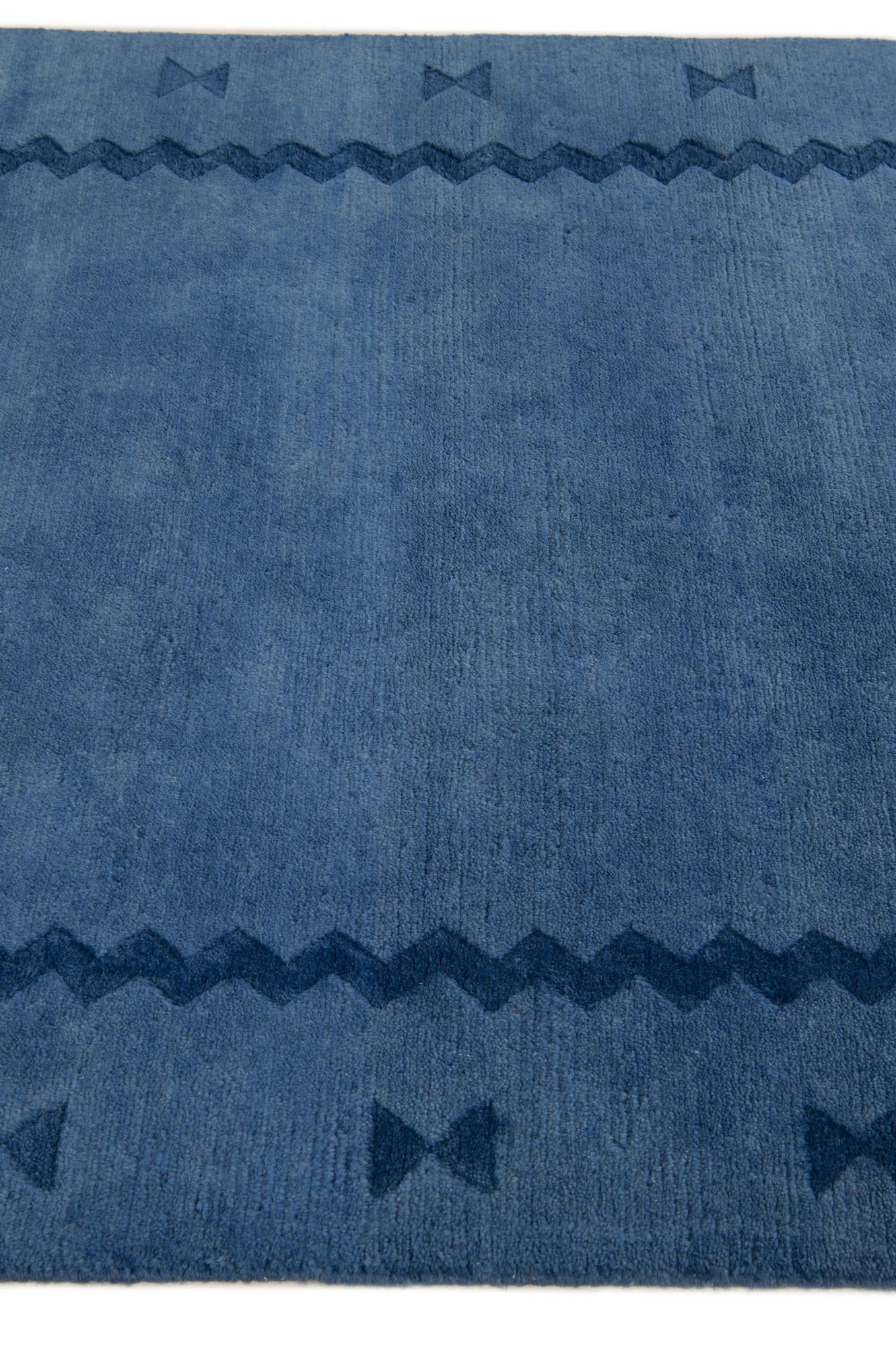 3' 11 x 5' 4 Hand Knotted Tibet Wool Rug