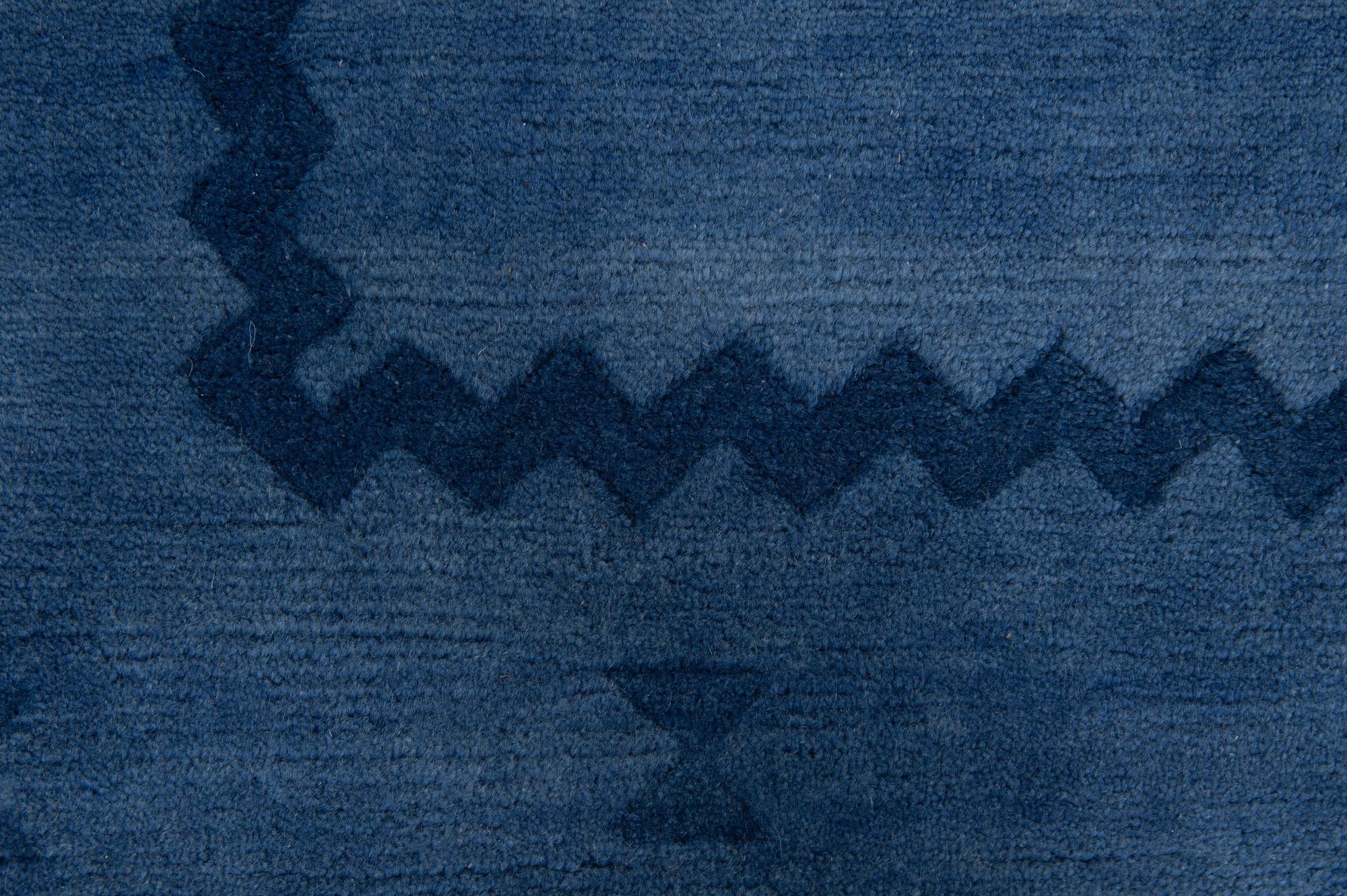 3' 11 x 5' 4 Hand Knotted Tibet Wool Rug