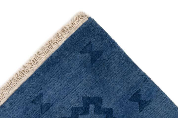 3' 11 x 5' 4 Hand Knotted Tibet Wool Rug