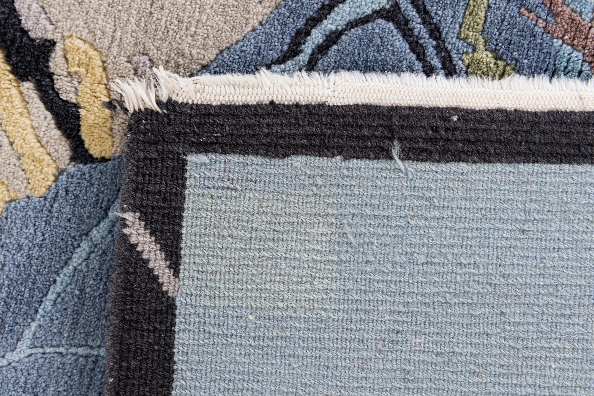 5' x 6' 5 Hand Knotted Tibet Wool Rug