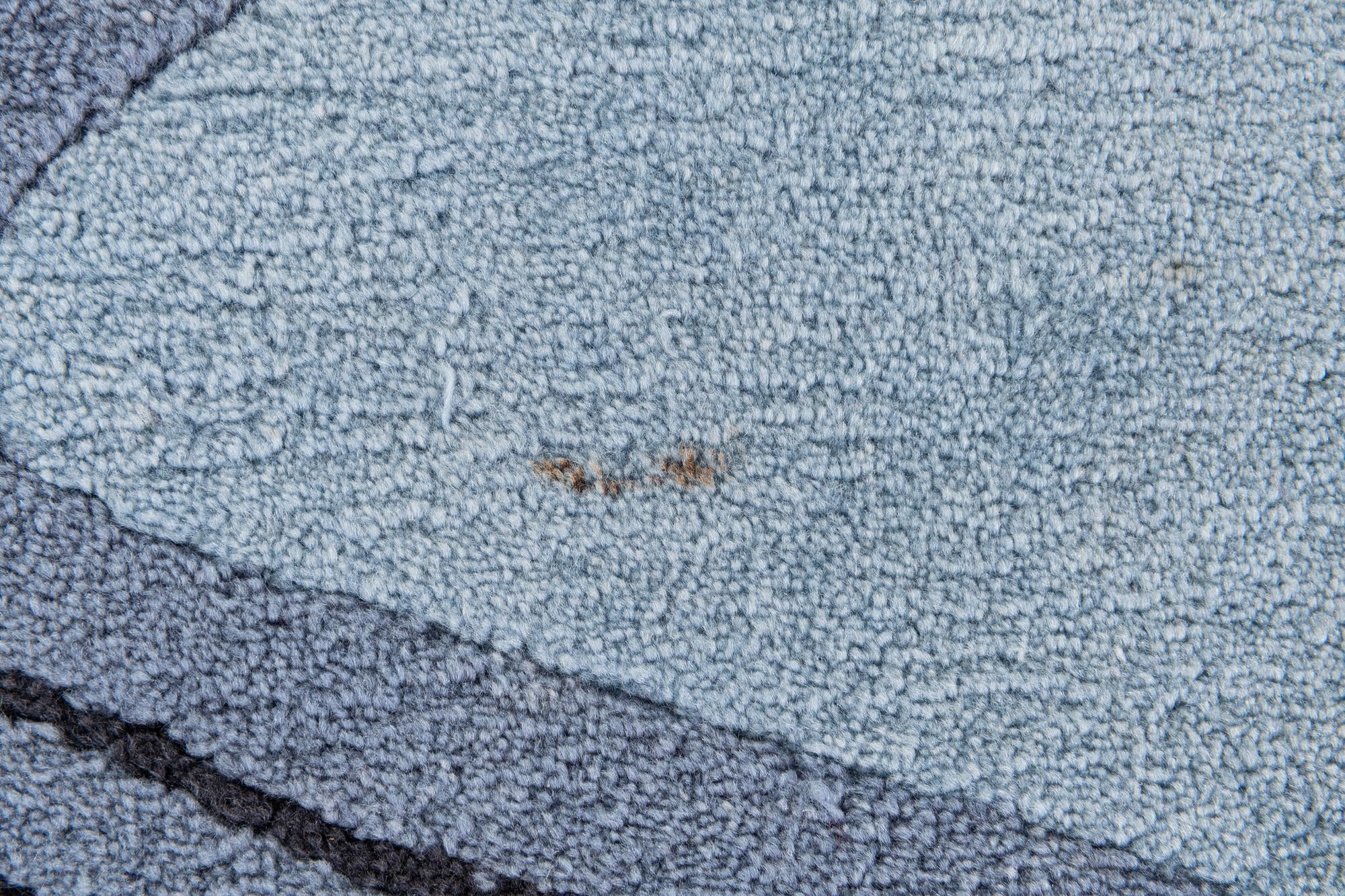 5' x 6' 5 Hand Knotted Tibet Wool Rug