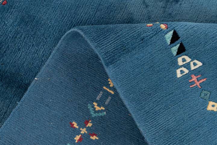 4' 8 x 6' 7 Hand Knotted Tibet Wool Rug