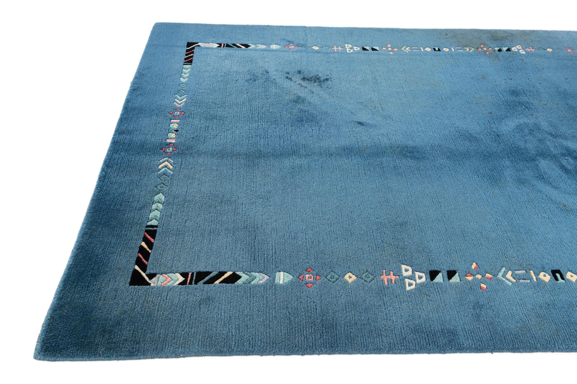 4' 8 x 6' 7 Hand Knotted Tibet Wool Rug