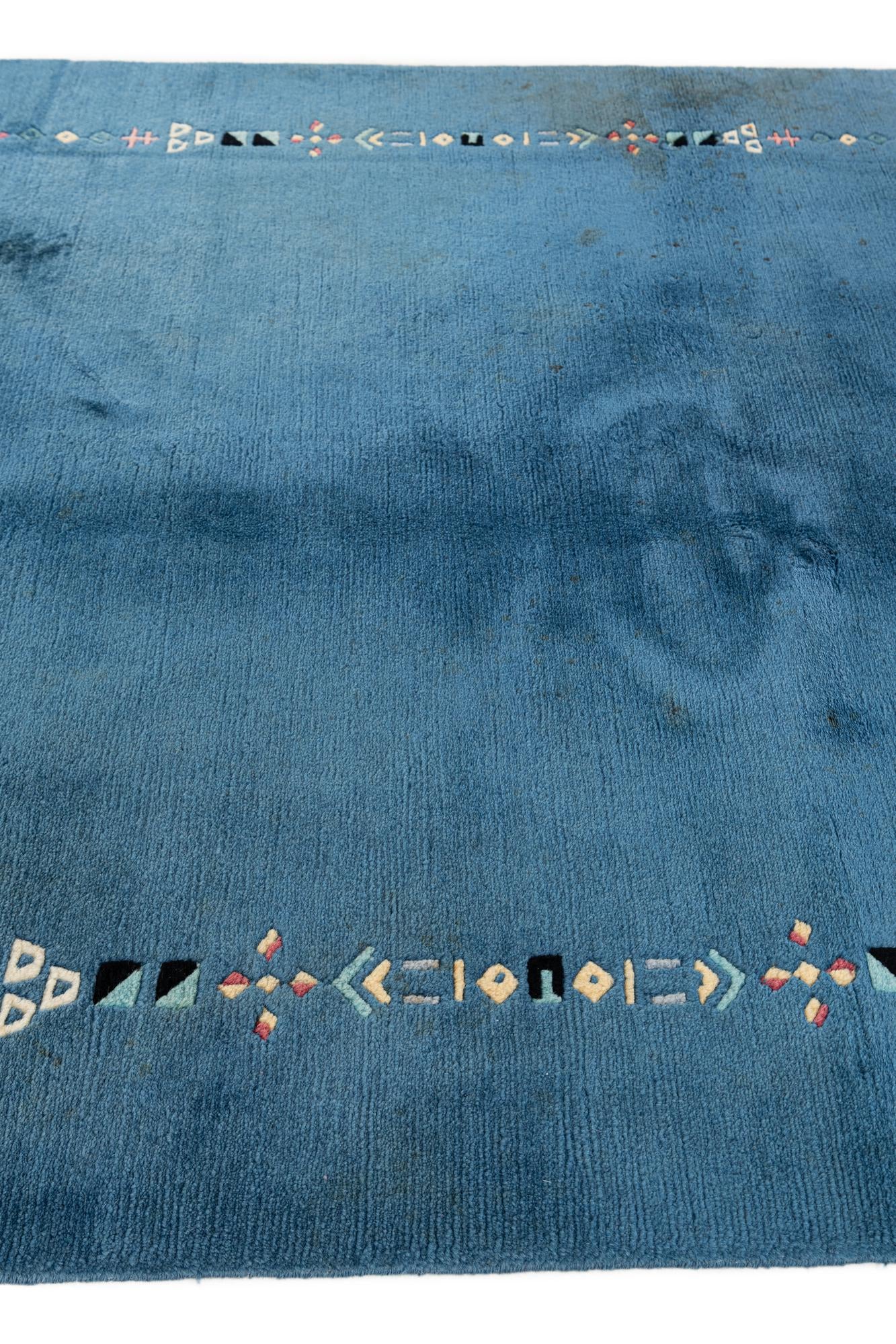4' 8 x 6' 7 Hand Knotted Tibet Wool Rug