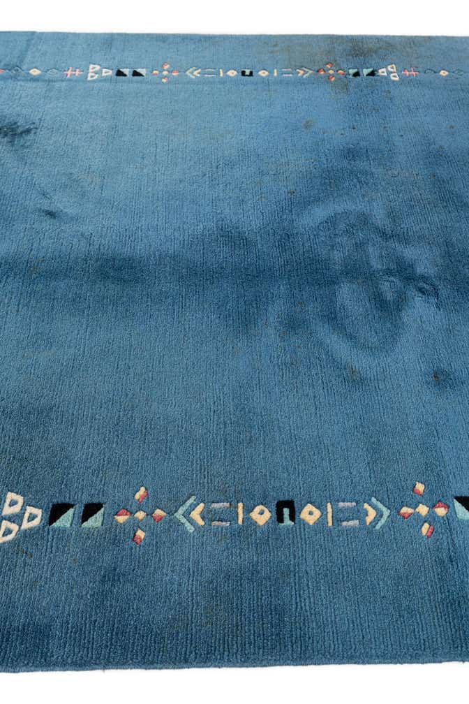 4' 8 x 6' 7 Hand Knotted Tibet Wool Rug