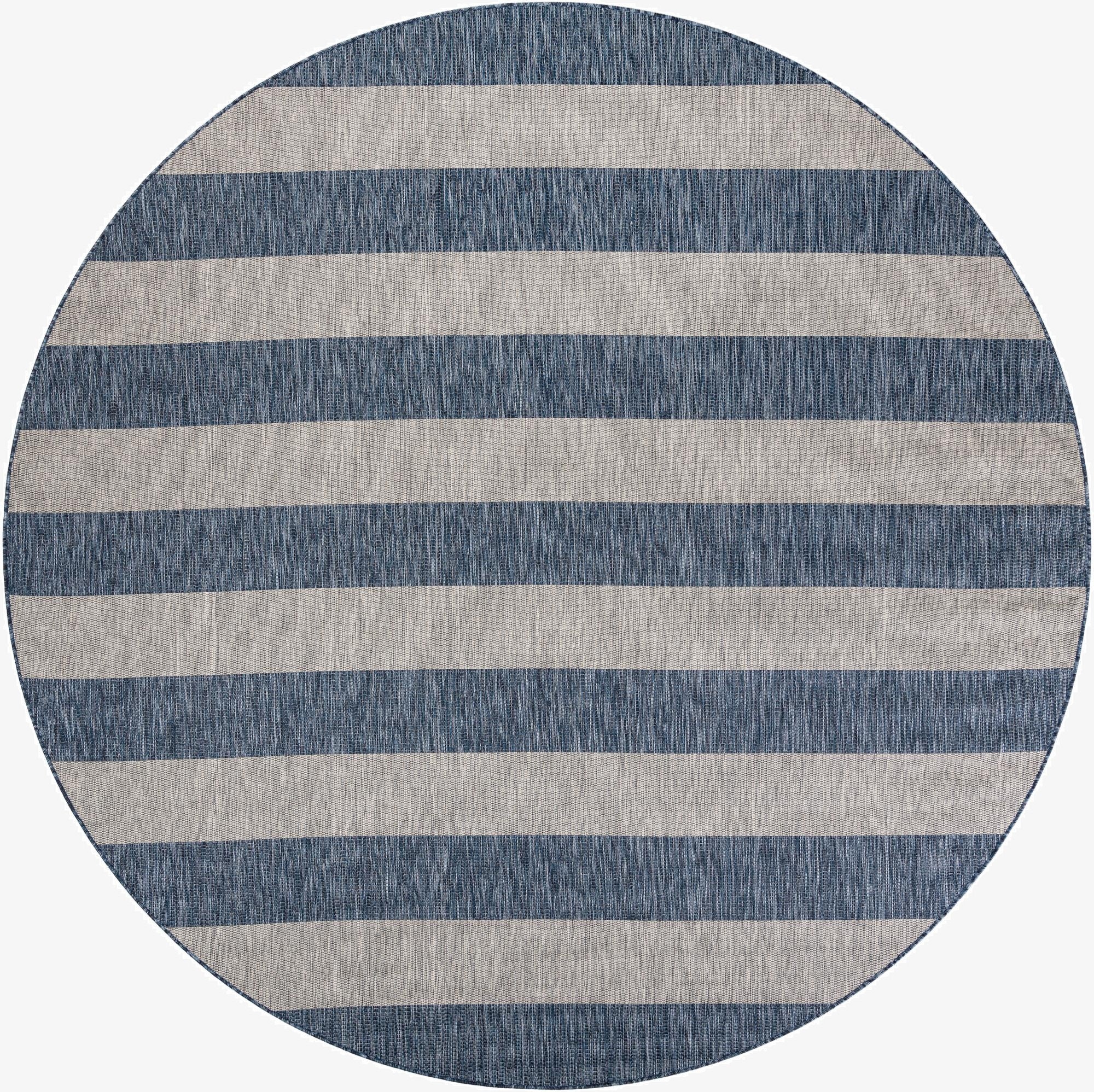 A 10' round blue and beige striped outdoor rug with a flatweave texture, suitable for a patio.