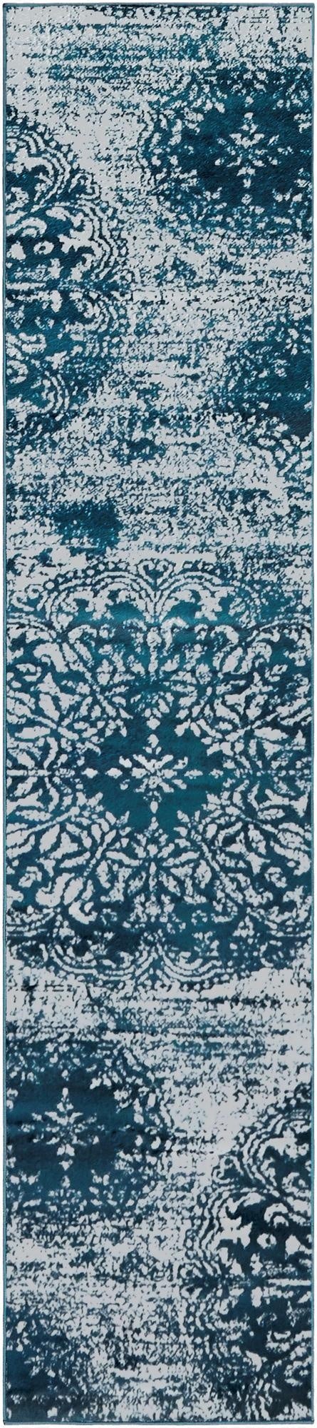 A 10 ft runner rug from the Monte Carlo collection, featuring a distressed traditional floral pattern in shades of blue and white, ideal for a hallway.