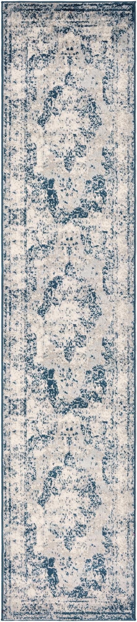 A 10 ft runner rug from the Rugs.com Monte Carlo collection, featuring a distressed blue medallion and border pattern on a light background, ideal for hallways.