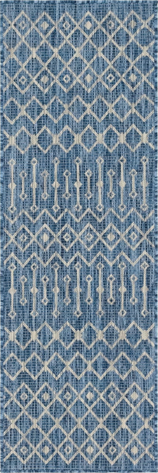 A 6 ft blue runner rug with a repeating white tribal geometric pattern, suitable for indoor/outdoor use.