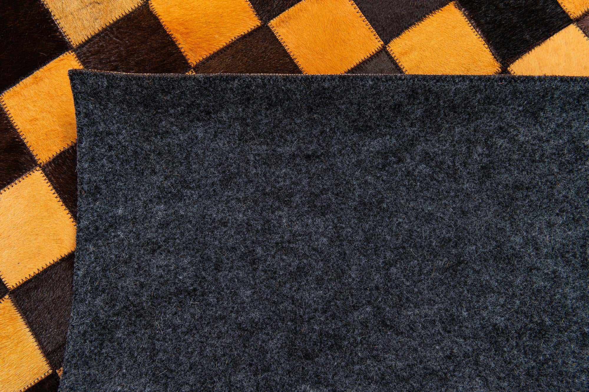5' 2 x 8' 1 Cowhide Stocks Rug
