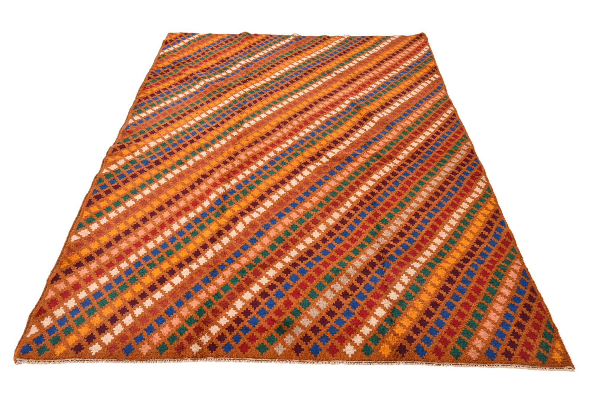 5' 6 x 8' Hand Knotted Balouch Wool Rug