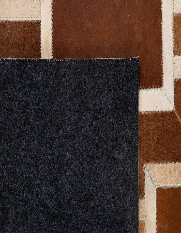 Detail image of 5' 1 x 8' 2 Cowhide - Patchwork Rug