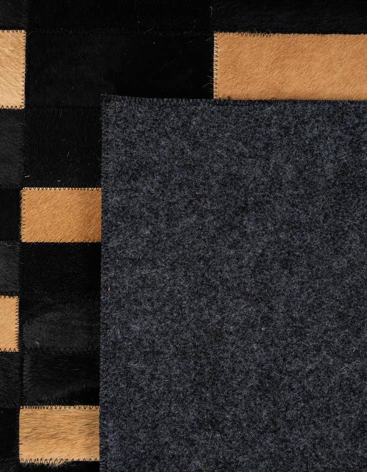 Detail image of 5' x 7' 11 Cowhide - Patchwork Rug