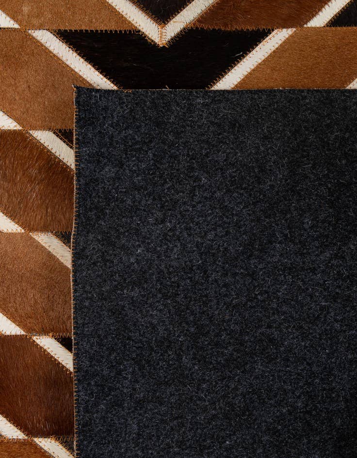 Detail image of 5' 1 x 8' Cowhide - Patchwork Rug