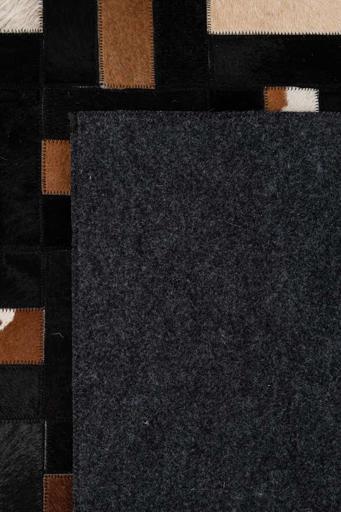 5' 3 x 8' 1 Cowhide - Patchwork Rug