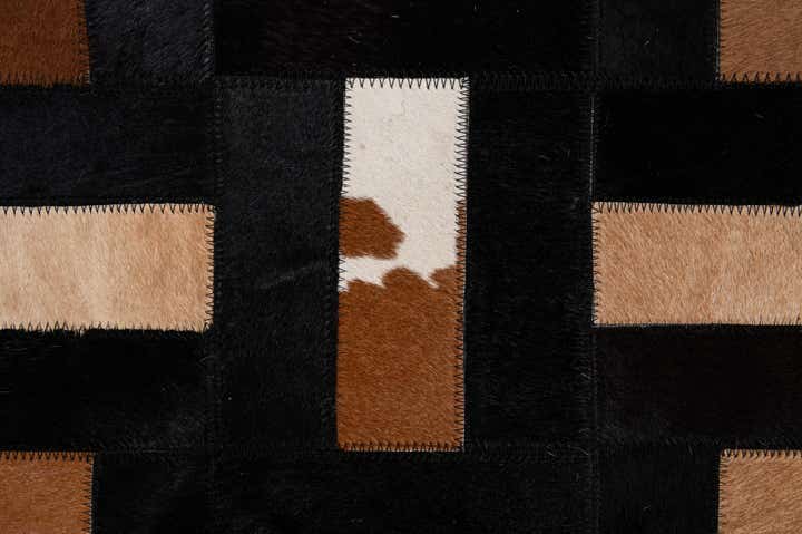 5' 3 x 8' 1 Cowhide - Patchwork Rug