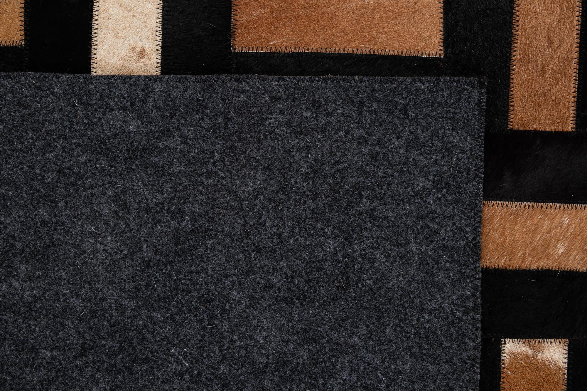 5' 3 x 8' 1 Cowhide - Patchwork Rug