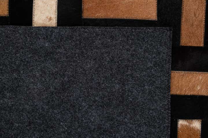 5' 3 x 8' 1 Cowhide - Patchwork Rug