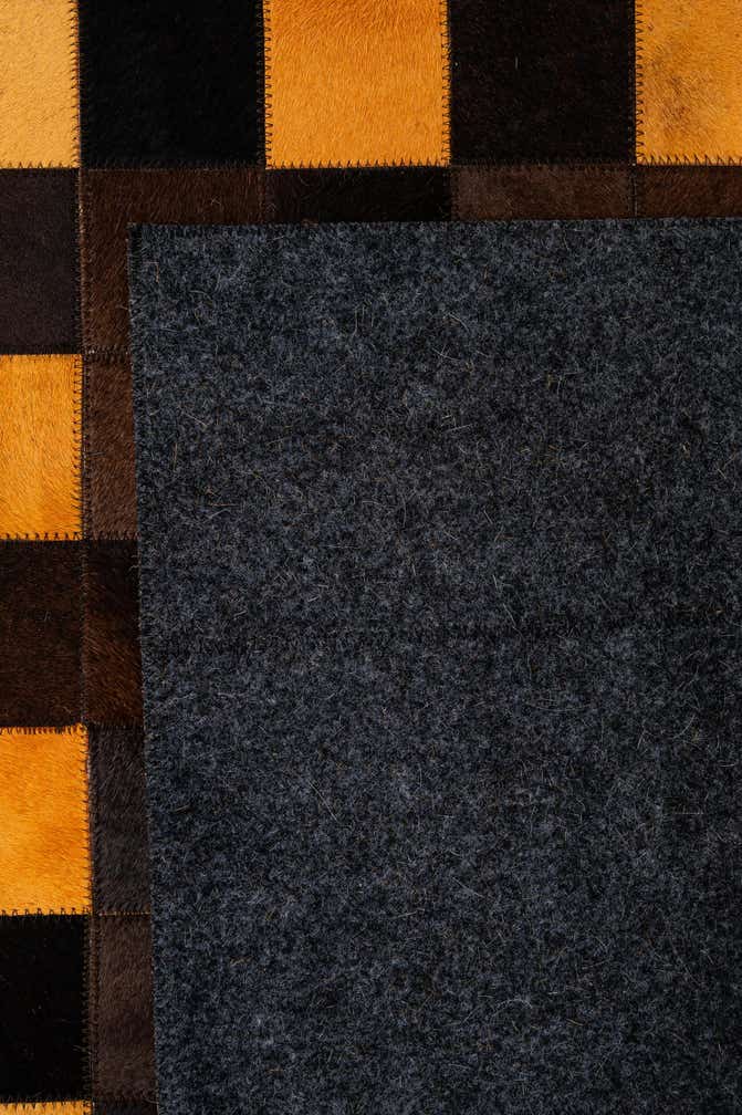 5' 2 x 8' 1 Cowhide - Patchwork Rug