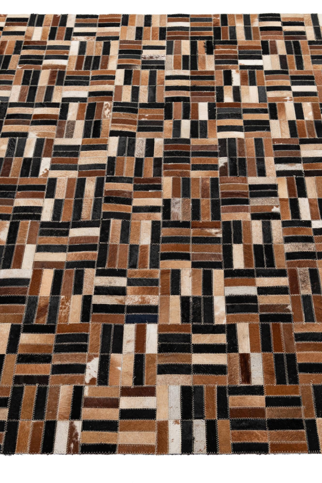 4' 11 x 8' 1 Cowhide - Patchwork Rug
