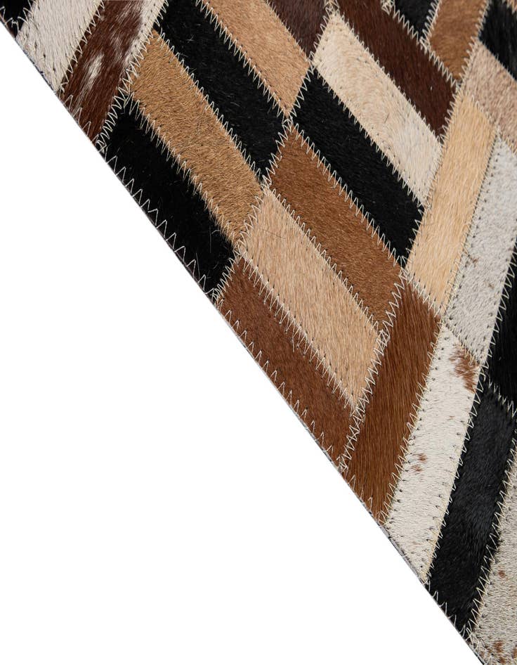 Detail image of 4' 11 x 8' 1 Cowhide - Patchwork Rug